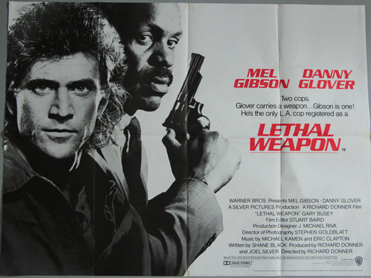 Movie poster for 'Lethal Weapon' featuring Mel Gibson and Danny Glover with a gun.